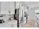 Bright kitchen featuring stainless steel appliances, modern countertops, and ample storage space for culinary enthusiasts at 2283 Arlington St, Sarasota, FL 34239