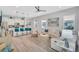 Open-concept living room showcases a stylish design with kitchen island seating and modern décor at 2283 Arlington St, Sarasota, FL 34239