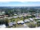 An aerial perspective shows this home's location in a quiet neighborhood with mature trees and well-maintained landscaping at 2434 Carlisle Pl, Sarasota, FL 34231