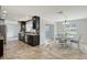 Well-designed kitchen with stainless appliances and a cozy dining area at 2434 Carlisle Pl, Sarasota, FL 34231