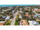 Scenic aerial view of a peaceful residential community, with tree-lined streets and well-kept homes close to ocean at 317 Harbor S Dr, Venice, FL 34285