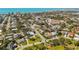 Calming aerial view of a neighborhood with well-spaced homes surrounded by trees, showing peaceful residential living at 317 Harbor S Dr, Venice, FL 34285