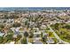 Scenic aerial shot of a charming neighborhood with a variety of homes, mature trees and streets at 317 Harbor S Dr, Venice, FL 34285