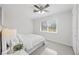 Bright bedroom with tiled floors and a ceiling fan at 317 Harbor S Dr, Venice, FL 34285
