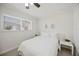 Bedroom featuring a window with blinds and neutral decor at 317 Harbor S Dr, Venice, FL 34285