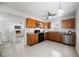 Functional kitchen with wood cabinets, stainless steel appliances, and an open layout perfect for cooking at 317 Harbor S Dr, Venice, FL 34285
