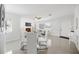 Bright living room with large windows, fireplace, open concept, and modern tile flooring, perfect gathering area at 317 Harbor S Dr, Venice, FL 34285