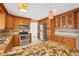 Well-equipped kitchen with stainless steel appliances, ample counter space, and stylish cabinetry at 3215 Pine Valley Dr, Sarasota, FL 34239