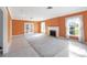 Bright living room with fireplace, tile floors, and ample natural light at 3215 Pine Valley Dr, Sarasota, FL 34239