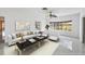 Living room with modern furniture, a view of the pool, and elegant decor at 3215 Pine Valley Dr, Sarasota, FL 34239