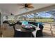 Screened-in pool area with dining set and lounge seating providing an outdoor space to relax and entertain at 3215 Pine Valley Dr, Sarasota, FL 34239