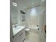 Clean bathroom with white vanity and shower-tub combination at 3650 S Sumter Blvd, North Port, FL 34287