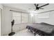 Bright bedroom featuring neutral colors, a ceiling fan, and plenty of natural light at 3721 Delta St # 93, Sarasota, FL 34232