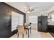Kitchen with appliances and a simple dining table and chairs at 3721 Delta St # 93, Sarasota, FL 34232