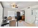 Bright kitchen and dining area with tile flooring and ample natural light at 3721 Delta St # 93, Sarasota, FL 34232