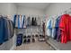 A closet with rods and shelving for clothing and shoes at 3815 75Th E Ln, Palmetto, FL 34221