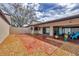 Private backyard featuring a brick patio and desert landscaping, perfect for relaxation and outdoor entertaining at 3933 Glen Oaks Manor Dr, Sarasota, FL 34232