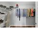 Walk-in closet with clothing racks and shelves for optimal organization at 3933 Glen Oaks Manor Dr, Sarasota, FL 34232