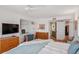 Bedroom with built-in desk, providing a dedicated workspace at 4835 Gulf Of Mexico Dr # 302B, Longboat Key, FL 34228