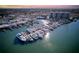 Aerial view of boats docked near waterfront condo complex at 501 Tamiami N Trl # 601, Venice, FL 34285