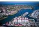 Aerial view of condo complex on the water with boat docks at 501 Tamiami N Trl # 601, Venice, FL 34285