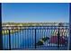 Scenic balcony view overlooking a beautiful waterway and neighborhood, perfect for outdoor enjoyment at 501 Tamiami N Trl # 601, Venice, FL 34285