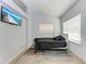 Small bedroom with neutral colors and natural light from the windows at 5103 73Rd E St, Bradenton, FL 34203