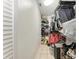 Walk-in closet with shelving, clothes racks, and tile floors at 5103 73Rd E St, Bradenton, FL 34203