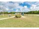 A fenced community dog park, designed for furry friends to play, socialize, and enjoy the outdoors at 5103 73Rd E St, Bradenton, FL 34203