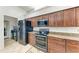 A spacious kitchen with stainless steel appliances and beautiful cabinetry at 5103 73Rd E St, Bradenton, FL 34203