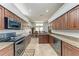 Bright and airy kitchen with granite countertops and ample cabinet space at 5103 73Rd E St, Bradenton, FL 34203