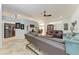Spacious living room featuring tile floors, neutral walls, and comfortable seating at 5103 73Rd E St, Bradenton, FL 34203