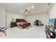 Spacious main bedroom featuring tile floors and a ceiling fan at 5103 73Rd E St, Bradenton, FL 34203
