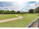 A picturesque park showcasing a gazebo and winding path, offering a tranquil setting for relaxation and community gatherings at 5103 73Rd E St, Bradenton, FL 34203
