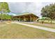 Community pavilion with picnic tables offers shade and a gathering spot for social events and leisurely activities at 5103 73Rd E St, Bradenton, FL 34203