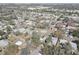 Wide aerial view of a neighborhood featuring mature trees and well-maintained homes at 511 74Th N Ave, St Petersburg, FL 33702