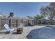 View of the backyard featuring a fire pit, backyard swing set, and brick pavers at 511 74Th N Ave, St Petersburg, FL 33702