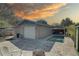 Aerial view of the backyard featuring an in-ground pool, covered patio, shed and lush landscaping at 511 74Th N Ave, St Petersburg, FL 33702