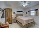 Bright bedroom with ample storage, a ceiling fan, and soft, natural light at 511 74Th N Ave, St Petersburg, FL 33702