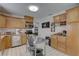 Well-lit kitchen featuring ample cabinetry, modern appliances, and an efficient layout at 511 74Th N Ave, St Petersburg, FL 33702