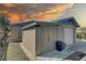 Exterior view of backyard shed is perfect for extra storage and has a side door at 511 74Th N Ave, St Petersburg, FL 33702