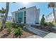 Charming condo exterior with well-kept landscaping and a paved walkway leading to the entrance at 5400 Gulf Dr # 35, Holmes Beach, FL 34217