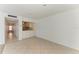 Bright kitchen with white cabinets and tile flooring, showcasing a clean and functional layout at 5400 Gulf Dr # 35, Holmes Beach, FL 34217