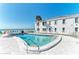 Inviting community pool provides a cool oasis steps from the beach with beach views at 5400 Gulf Dr # 35, Holmes Beach, FL 34217