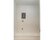 Bare, but freshly painted, utility closet space providing functional storage at 5400 Gulf Dr # 35, Holmes Beach, FL 34217