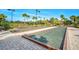 Bocce ball courts with nice landscaping and well-maintained grounds on a sunny day at 5656 Cantucci St, Nokomis, FL 34275