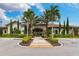 Charming community clubhouse featuring lush landscaping and ample parking for residents and guests at 5656 Cantucci St, Nokomis, FL 34275