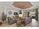 Bright living room featuring two sofas, recessed lights, ceiling fan and elegant decor at 5656 Cantucci St, Nokomis, FL 34275