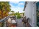 Inviting outdoor seating area with stylish furniture, perfect for relaxing and enjoying the scenic views at 5708 Holmes Blvd, Holmes Beach, FL 34217
