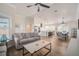 Open-concept living area combines living, kitchen, and dining for seamless entertaining at 5708 Holmes Blvd, Holmes Beach, FL 34217
